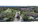 Aerial view showing community features, including a guardhouse and pond at 23465 Harborview Rd # 1021, Punta Gorda, FL 33980