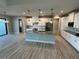Spacious kitchen with white cabinets and granite countertops at 8356 Tecumseh Cir, Port Charlotte, FL 33981