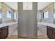 Spa-like bathroom with double vanities, large shower, and modern tile at 8356 Tecumseh Cir, Port Charlotte, FL 33981