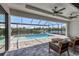 Relaxing screened-in pool and lanai overlooking the canal at 8356 Tecumseh Cir, Port Charlotte, FL 33981