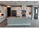 Modern kitchen with white cabinets and marble countertops at 8356 Tecumseh Cir, Port Charlotte, FL 33981