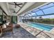 Large pool and lanai with canal views and plenty of seating at 8356 Tecumseh Cir, Port Charlotte, FL 33981