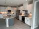 Modern kitchen with white cabinets and marble countertops at 8356 Tecumseh Cir, Port Charlotte, FL 33981
