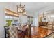 Spacious dining room with hardwood floors and water views at 13310 Anglers Way, Placida, FL 33946