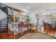 Elegant entryway with spiral staircase, hardwood floors, and chandelier at 13310 Anglers Way, Placida, FL 33946
