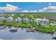 Luxury waterfront homes with private docks and lush landscaping at 13310 Anglers Way, Placida, FL 33946