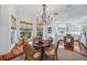 Bright breakfast nook with window seat, table, and kitchen view at 13310 Anglers Way, Placida, FL 33946