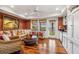 Waterfront Gathering room with comfortable seating and hardwood floors at 13310 Anglers Way, Placida, FL 33946