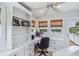 Home office with built-in shelves and water views at 13310 Anglers Way, Placida, FL 33946