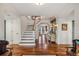 Elegant hardwood staircase leading to upper level at 13310 Anglers Way, Placida, FL 33946