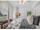 Cozy bedroom with a comfortable bed and plenty of natural light at 13310 Anglers Way, Placida, FL 33946