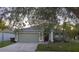 House exterior with green lawn at 2332 Potomac Mark Pl, Ruskin, FL 33570