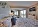 Main bedroom with king-size bed and water views at 53 W Bay Heights S Rd # 204, Englewood, FL 34223