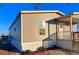 Beautiful single story home with a covered porch and manicured landscaping at 1377 Ibis Dr, Englewood, FL 34224