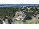 Aerial view of a waterfront home on a canal with quick access to the Gulf at 3440 Downing W St, Englewood, FL 34224