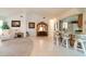 Bright and spacious living area with open floor plan and breakfast bar seating at 3440 Downing W St, Englewood, FL 34224