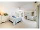 Bright bedroom with a comfortable bed and ample closet space at 3440 Downing W St, Englewood, FL 34224