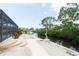 Walkway to private canal access with lush landscaping at 3440 Downing W St, Englewood, FL 34224
