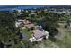 Waterfront property with lush landscaping and canal views at 3440 Downing W St, Englewood, FL 34224