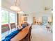 Charming dining room with wood table and access to kitchen at 3440 Downing W St, Englewood, FL 34224