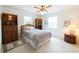 Guest bedroom with built-in shelving and comfortable bed at 3440 Downing W St, Englewood, FL 34224