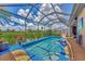 This screened pool provides a private oasis in the backyard at 3275 Osprey Ln, Port Charlotte, FL 33953