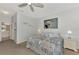Spacious bedroom with coastal decor and en-suite bathroom at 3275 Osprey Ln, Port Charlotte, FL 33953