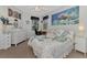 Bedroom with a queen-size bed, dresser and desk at 3275 Osprey Ln, Port Charlotte, FL 33953
