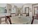 Casual dining area features a round table, chairs, and decorative centerpiece at 3275 Osprey Ln, Port Charlotte, FL 33953