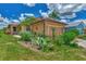 Well-maintained house with a landscaped front yard and a two-car garage at 3275 Osprey Ln, Port Charlotte, FL 33953