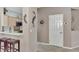 Kitchen features light wood cabinets, modern appliances, and a breakfast bar at 3275 Osprey Ln, Port Charlotte, FL 33953