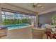 Enclosed patio with pool and seating area at 3275 Osprey Ln, Port Charlotte, FL 33953