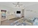 Spacious bedroom with a dresser, TV, and a comfortable bed at 3275 Osprey Ln, Port Charlotte, FL 33953