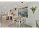 Eat-in kitchen with modern appliances and a breakfast nook at 3275 Osprey Ln, Port Charlotte, FL 33953