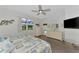 Bedroom with coastal decor and access to backyard at 3275 Osprey Ln, Port Charlotte, FL 33953