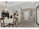 Bright dining area with a round table and four chairs, offering a casual and inviting space at 3275 Osprey Ln, Port Charlotte, FL 33953