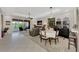 Open floor plan with access to lanai and pool at 3275 Osprey Ln, Port Charlotte, FL 33953
