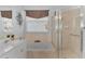 Bathroom with a single vanity, bathtub, and shower at 3275 Osprey Ln, Port Charlotte, FL 33953