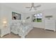 Relaxing bedroom with coastal decor and a ceiling fan at 3275 Osprey Ln, Port Charlotte, FL 33953