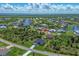 Waterfront property showcasing a beautiful home with access to canals and waterways at 8111 Arlewood Cir, Port Charlotte, FL 33981