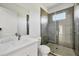 Clean bathroom with white vanity, toilet and walk in shower at 8111 Arlewood Cir, Port Charlotte, FL 33981