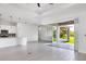 Modern kitchen with white cabinets, stainless steel appliances and an island at 8111 Arlewood Cir, Port Charlotte, FL 33981