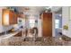Kitchen with granite countertops and breakfast bar at 8409 Placida Rd # 308, Placida, FL 33946