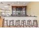 Community bar with granite countertop and comfortable seating at 8409 Placida Rd # 308, Placida, FL 33946