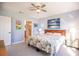Bright bedroom with a king bed, ensuite bathroom, and ample natural light at 8409 Placida Rd # 308, Placida, FL 33946