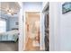 Clean bathroom with shower/tub combo and laundry area at 8409 Placida Rd # 308, Placida, FL 33946