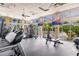 Well-equipped fitness center with various exercise machines and scenic views at 8409 Placida Rd # 308, Placida, FL 33946