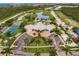 Community clubhouse with pool, tennis, and parking at 8409 Placida Rd # 308, Placida, FL 33946