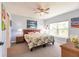 Main bedroom with a king-size bed and plenty of natural light at 8409 Placida Rd # 308, Placida, FL 33946