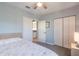 Bright bedroom with double bed, closet, and access to the kitchen at 8409 Placida Rd # 308, Placida, FL 33946